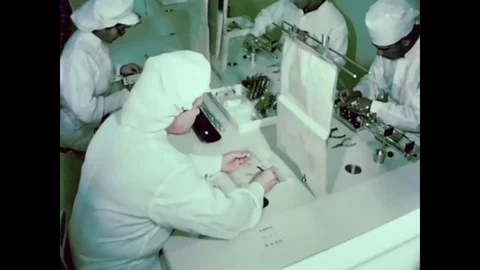 1960 - Electrical components of a missile are assembled by hand. Stock Footage 83048815