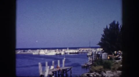 1960: journey through coastal area having roads and canals FLORIDA Stock Footage