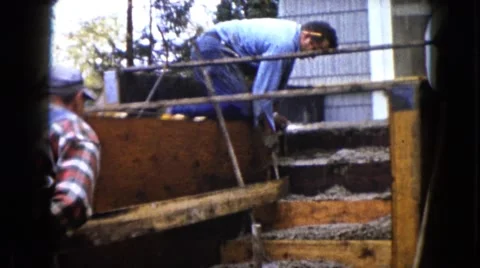1960: man hammering WAUCONDA, ILLINOIS Stock Footage