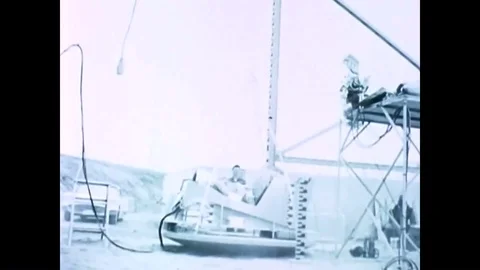 1960 - A man is shown geared up for an impact test in a space vehicle. Stock Footage 85228246