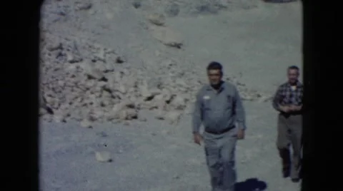 1960: people walking about what appears to be rock quarry NEW MEXICO Stock Footage