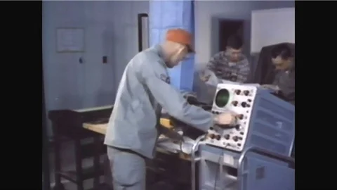 1960 - Repairmen and data processors are seen at work at a USAF missile Video stock 92631786