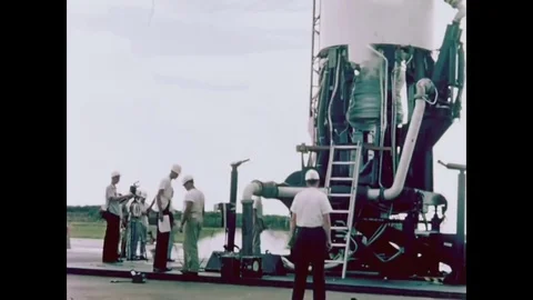 1960 - Safety engineers work on a Thor missile on the launch pad before another Stock Footage 83424422