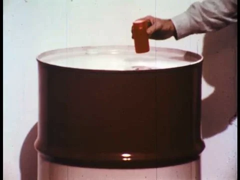1960s _A toxicologist demonstrates the dangers of Hydrogen Sulfide on a lab rat Stock Footage