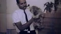 1960s African American Black Man Holds His Pet Dog Doing Vintage Film Home Movie HD Footage