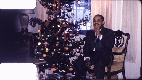 1960s African American Black Man Family Christmas Tree Vintage Film Home Movie Stock Footage