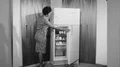 1960s African American Black Woman Opens Refrigerator Door Vintage Film Movie 4k or 4k+ Resolution