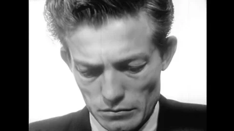 1960s - After reading over his suicide note, a young man climbs out of the Video stock 146474860