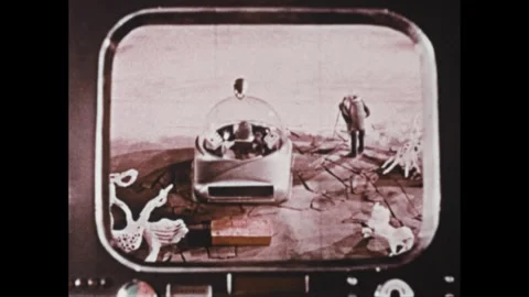 1960s: Animation, image on screen, landing craft drops object, drives away, man Stock Footage 307513841