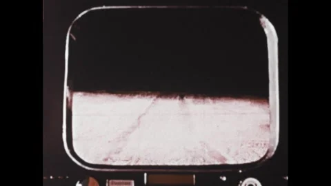 1960s: Animation, man at control panel. Image of planet surface on screen. Close Stock Footage 307513851