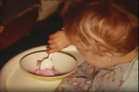 1960's archive-toddler eats ice cream Stock Footage 20472775