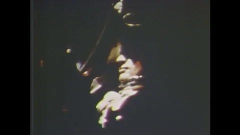 1960s: Astronaut aboard the Gemini capsule. Earth's surface from space, Stock Footage 84905614