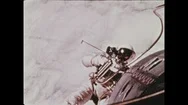 1960S: Astronaut Floats Outside Space Shuttle.  Earth. Stock Footage