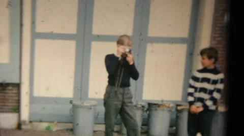 1960s A boy with a camera Video stock 56259188