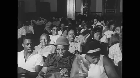 1960s: Church congregation claps and sings during  a civil rights meeting. Vídeo Stock 169233676