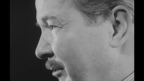 1960s: close up of man speaking / close up of man drinking / diagram of Stock Footage 74819677