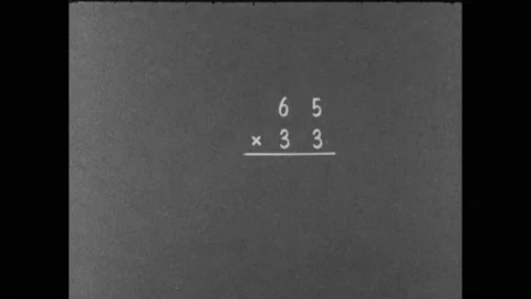 1960s: Column of numbers, multiplication... | Stock Video | Pond5