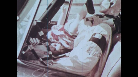 1960s: Crash test dummies are maimed and mutilated after crashes. Baby in Video stock 121589397