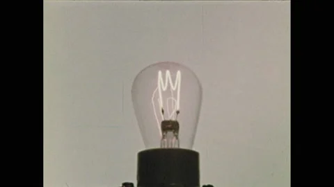 1960s: Diagram of molecules. Lightbulb. Florescent bulb. Light spectrum. Radio Stock Footage