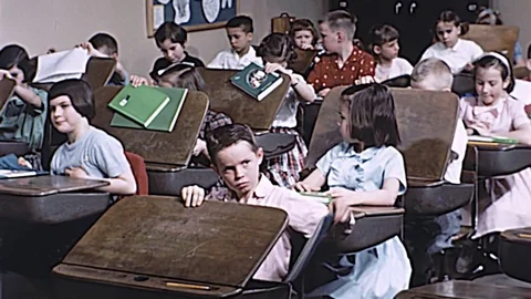 1960s Elementary School Students Open Desks Get Text Vintage Old Film Movie Stock Footage 80941722