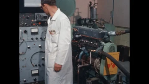 1960s: An engine being prepared for testing. Video stock 260128259