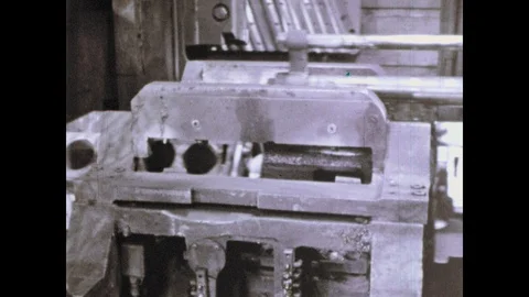 1960s: Engine casing on conveyor belt mo... | Stock Video | Pond5