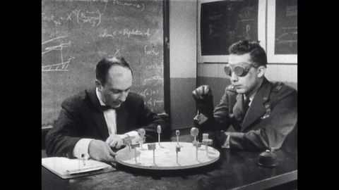 1960s: Engineering psychologist shows sample of knob shapes to blindfolded and Vidéo 129971711