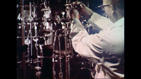1960s : Engineers Testing Oil and Lubrication for Ships in His Laboratory Stock Footage 74674515