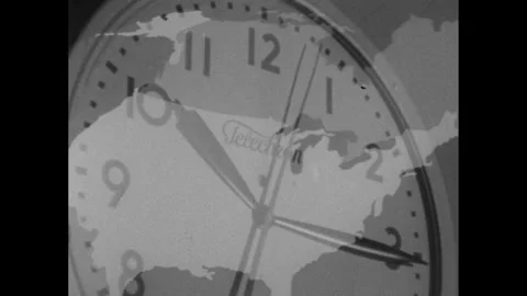 1960s: Faces of clocks with second hands turning. Map of North America with time Stock Footage 254997380