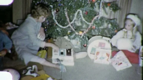 1960s Family XMAS MORNING Open PRESENTS KIDS Christmas Vintage Film Home Movie Stock Footage