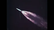 1960S: Flames Fading As Nasa Rocket Travel Up Through Sky Towards Space. Rocket Stock Footage
