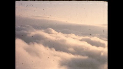 1960s Flying Floating Above the Clouds Heaven Vintage Old Film Home Movie Stock Footage 114996568