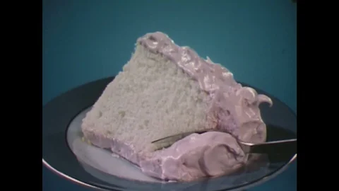 1960s: Fork takes piece out of cake / Pie / Pudding / Pancakes. Stock Footage