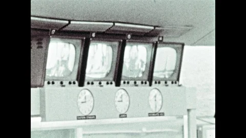 1960s: Four televisions with three clocks. Satellite dish, Saturn C1 rocket Stock Footage 101403771