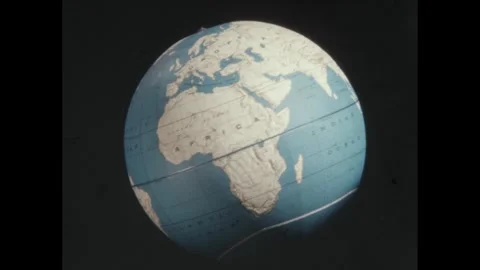 1960s: Globe of Earth rotates on axis th... | Stock Video | Pond5