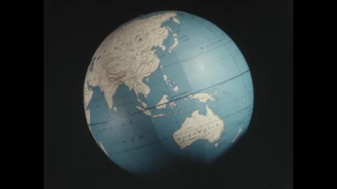 1960s: Globe of Earth rotates on axis. | Stock Video | Pond5