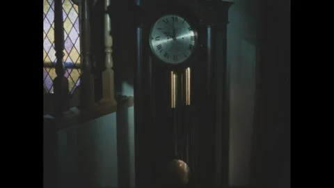 1960s: Grandfather clock. Stock Footage 277675397