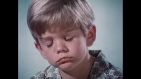 1960s: Grumpy car talks. Boy looks ashamed. Dog bears teeth. Grumpy car. Car Stock Footage 243770124