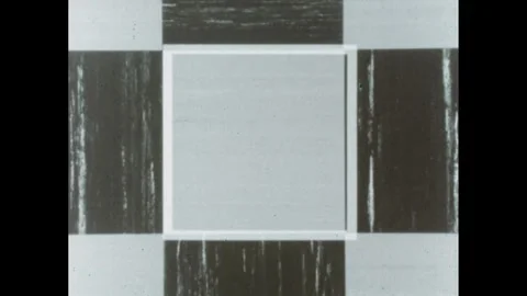 1960s: High angle of floor, person walking, zoom in on tiles, square appears. Stock Footage 262087376