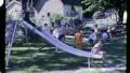 1960s KIDS at Play on Slide PLAYGROUND FUN Children Vintage Old Film Home Movie HD Footage