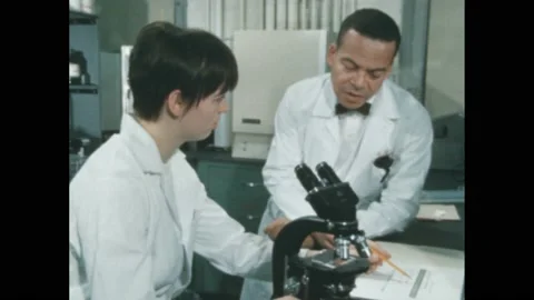 1960s: Lab. Test tubes. Man and woman ... | Stock Video | Pond5