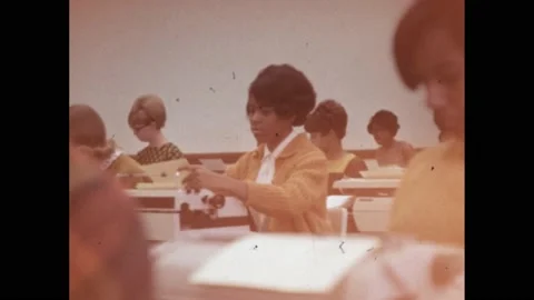 1960s: lady sits at typewriter in class. Secretaries in office. Man in technical Stock Footage 192252849