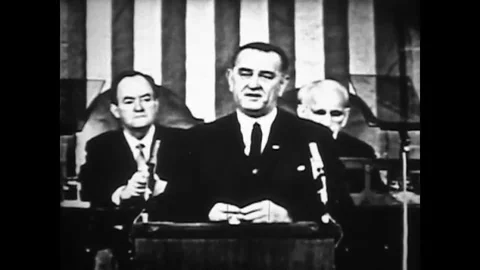 1960s - LBJ gives a speech explaining that all Americans must join Stock-Footage 145399704