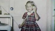 1960S Little Girl On The Phone To Daddy Mom Vintage Old Retro Film Home Movie  Stock Footage