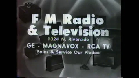 1960s - A local electronics store is advertised at a drive-in theater. Stock Footage 161014153