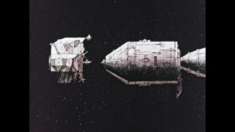 1960s: Lunar module docks with spacecraft, detaches from spacecraft. Stock Footage 100302300