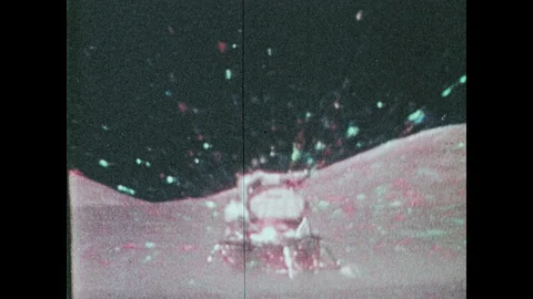 1960s: Lunar module takes off from surface of the moon, travels above moon. Stock Footage 104882244
