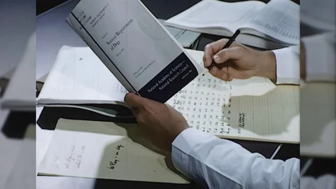 1960s Man Checks Data Writes Report Manual Vintage Film Industrial Retro Movie Stock Footage 84251788