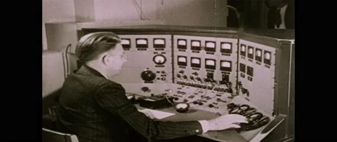 1960s: man at control panel adjusting knobs, scientists setting up large 스톡 동영상 160169786
