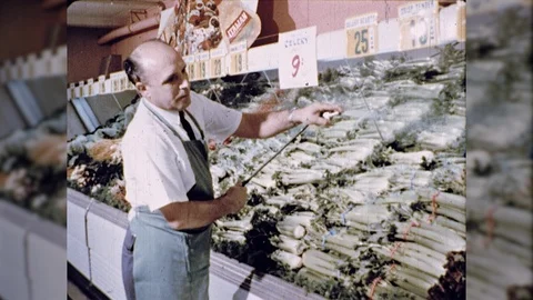 1960s Man Grocer Supermarket Fresh Vegetables Section Produce Vintage Film Movie Stock Footage 106212118